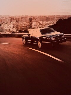 Черный Бентли на повороте обои