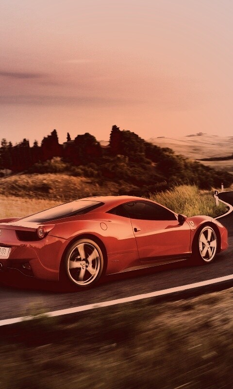 Красная феррари на извилистой дороге обои