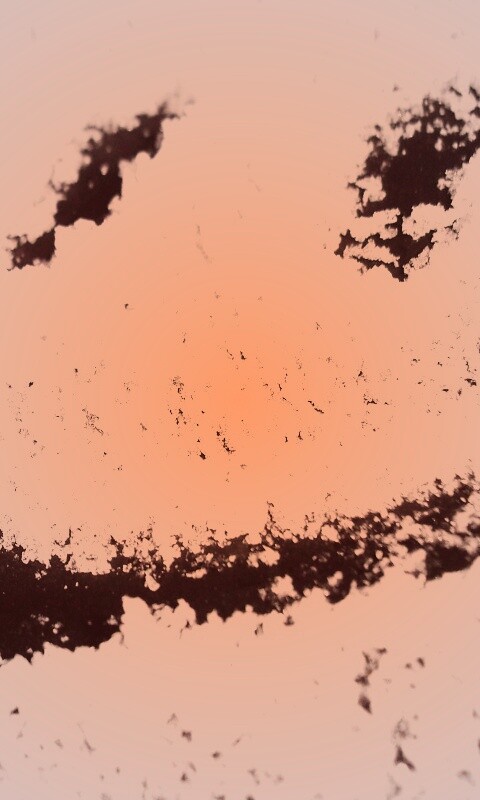 Смайлик на заснеженном стекле обои