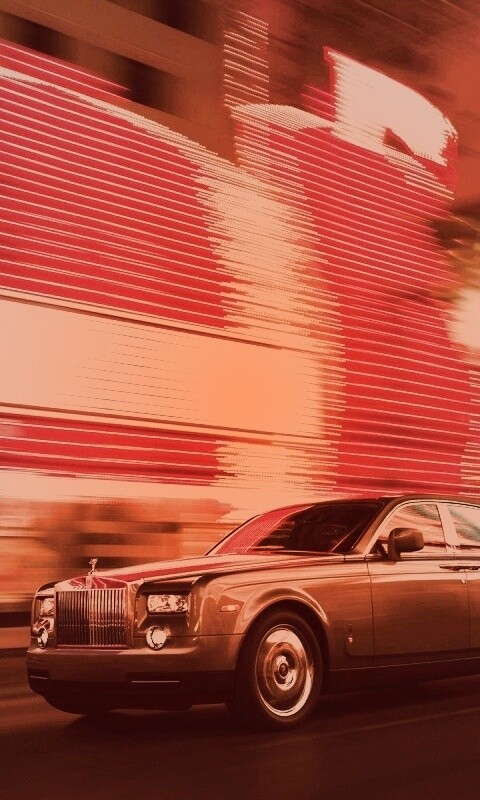 Rolls-Royce Phantom едет через город обои