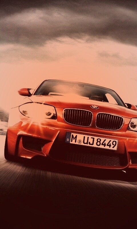 Оранжевый BMW M1 Coupe на треке обои