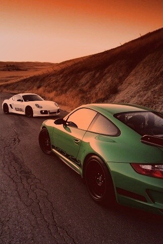 Два порша на горной дороге обои