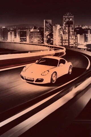 Черный и белый Porsche на автомагистрале. обои