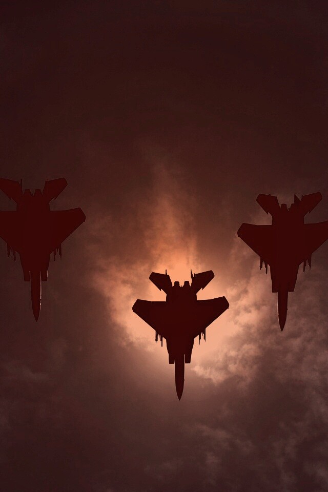 Ряд истрибителей на фоне солнца обои