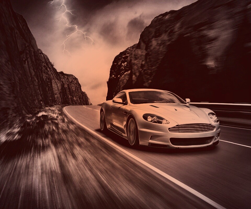 Астон мартин на горной дороге обои