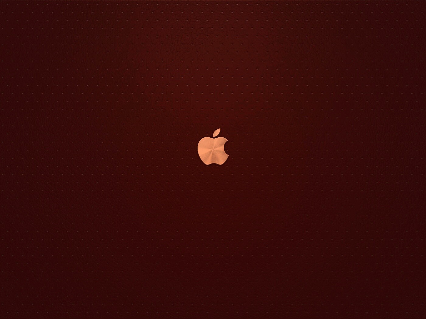 Маленький логотип Apple на перфорированной коже обои