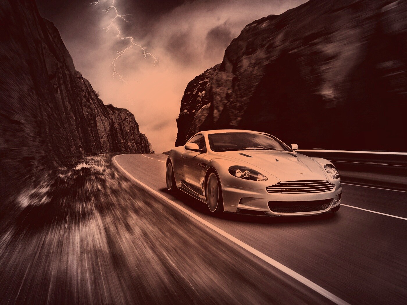 Астон мартин на горной дороге обои