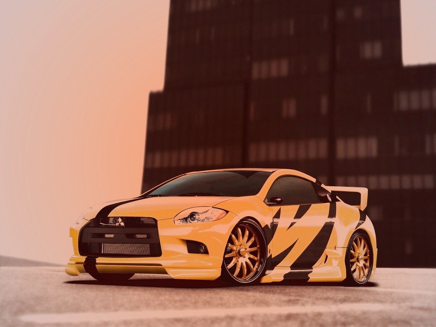 Mitsubishi жёлтого цвета с черными полосами обои