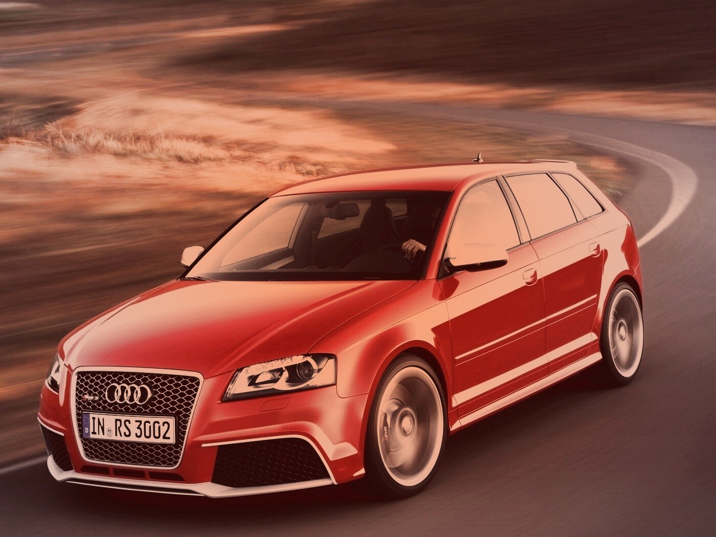 Красная ауди мчится по извилистой дороге обои