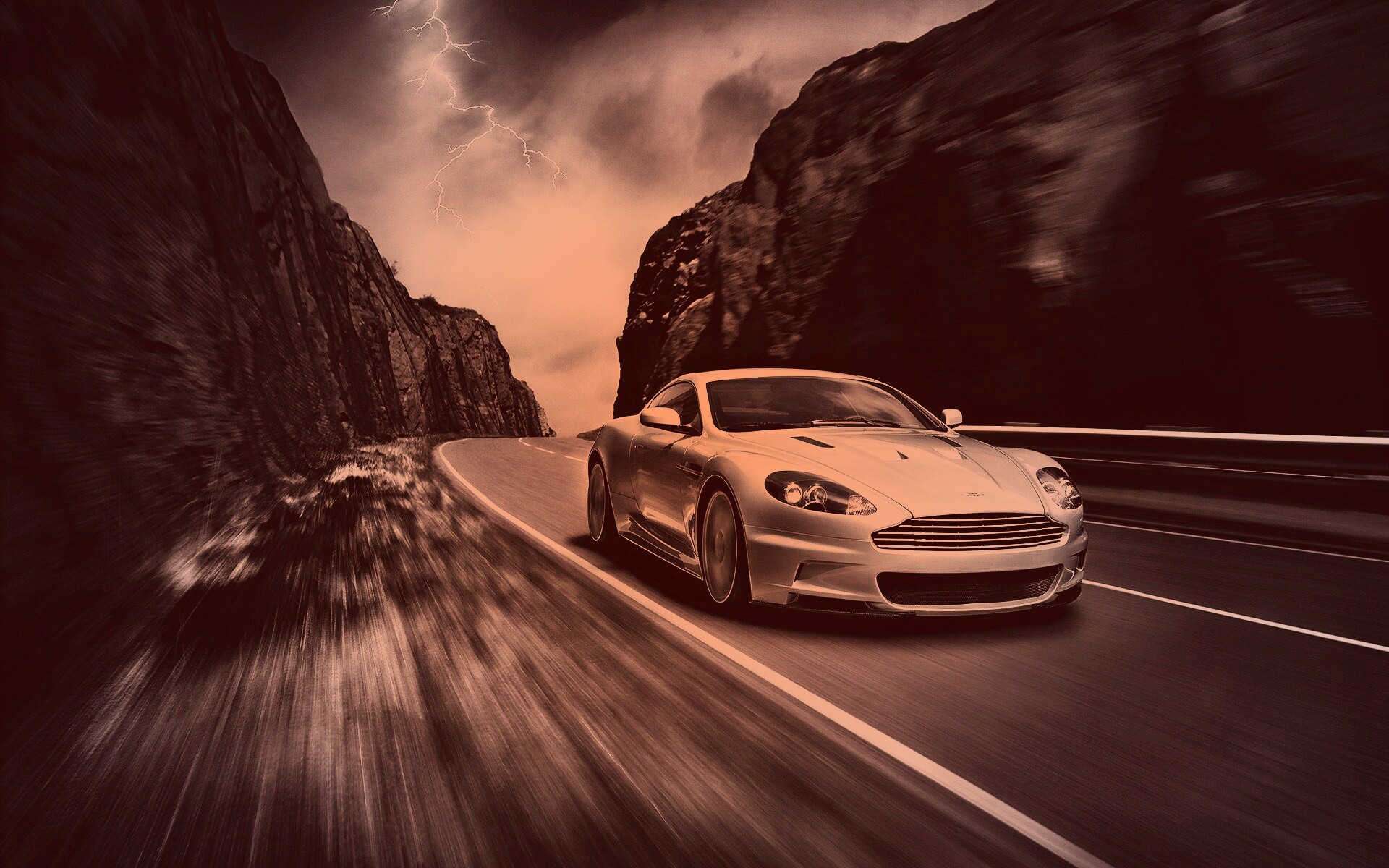 Астон мартин на горной дороге обои