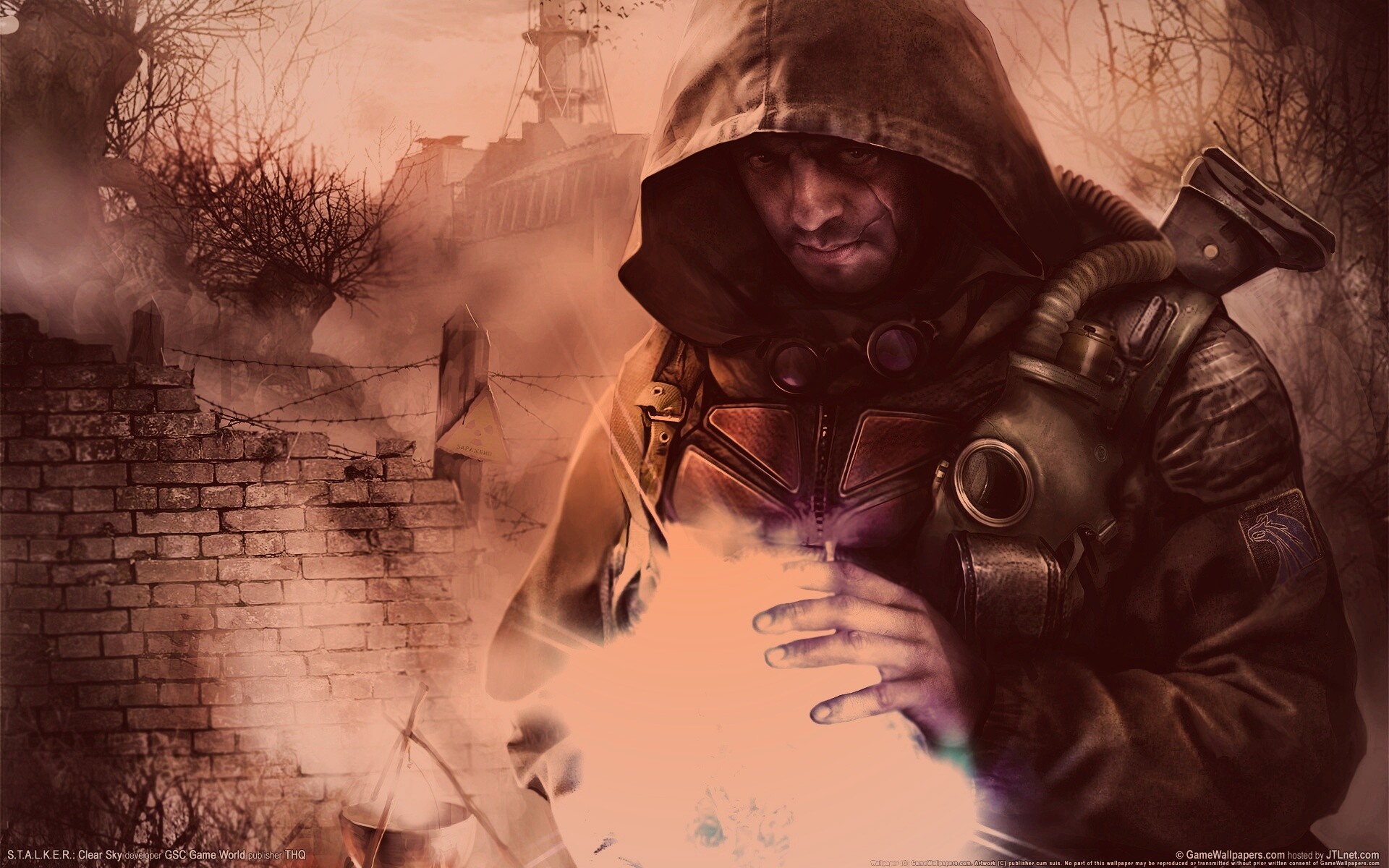 Сталкер с энергетическим артефактом в руках обои
