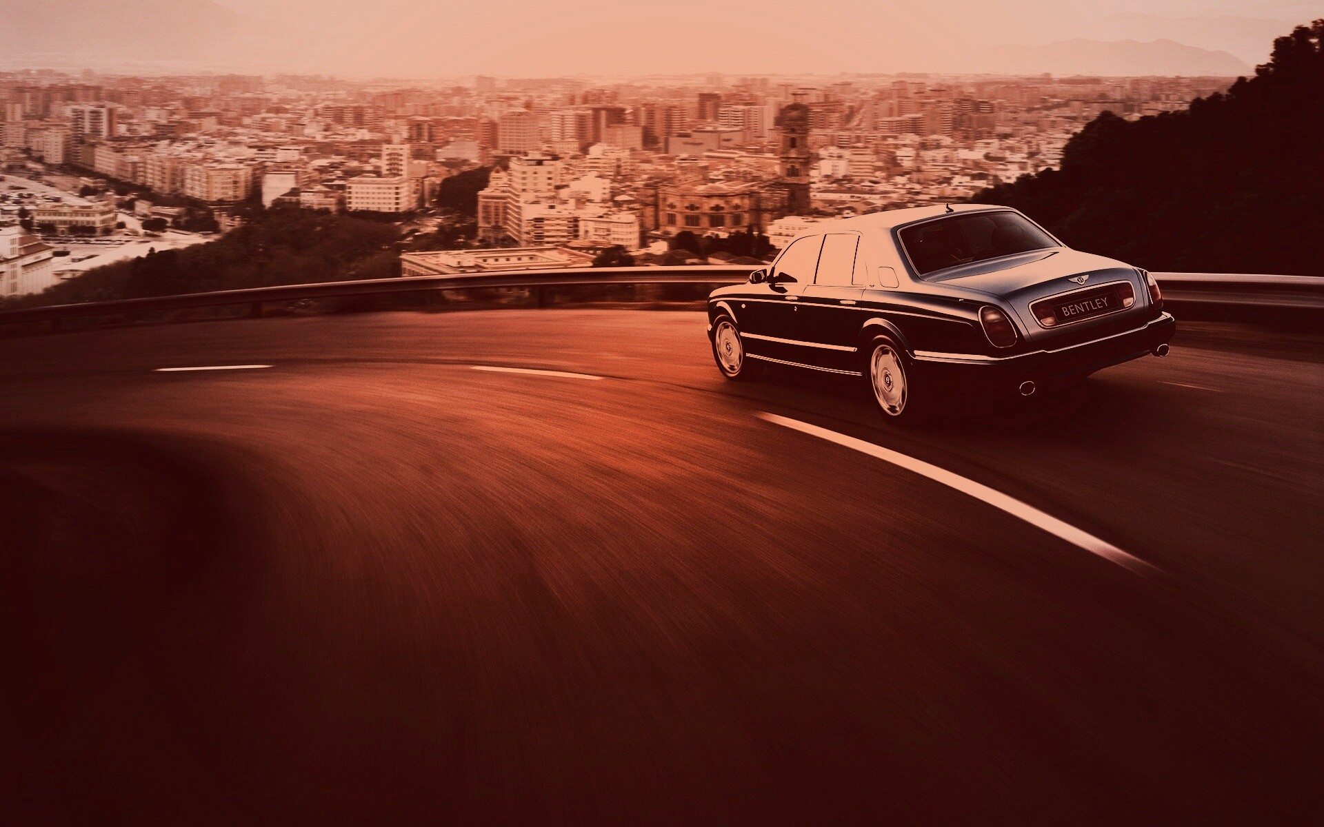 Черный Бентли на повороте обои