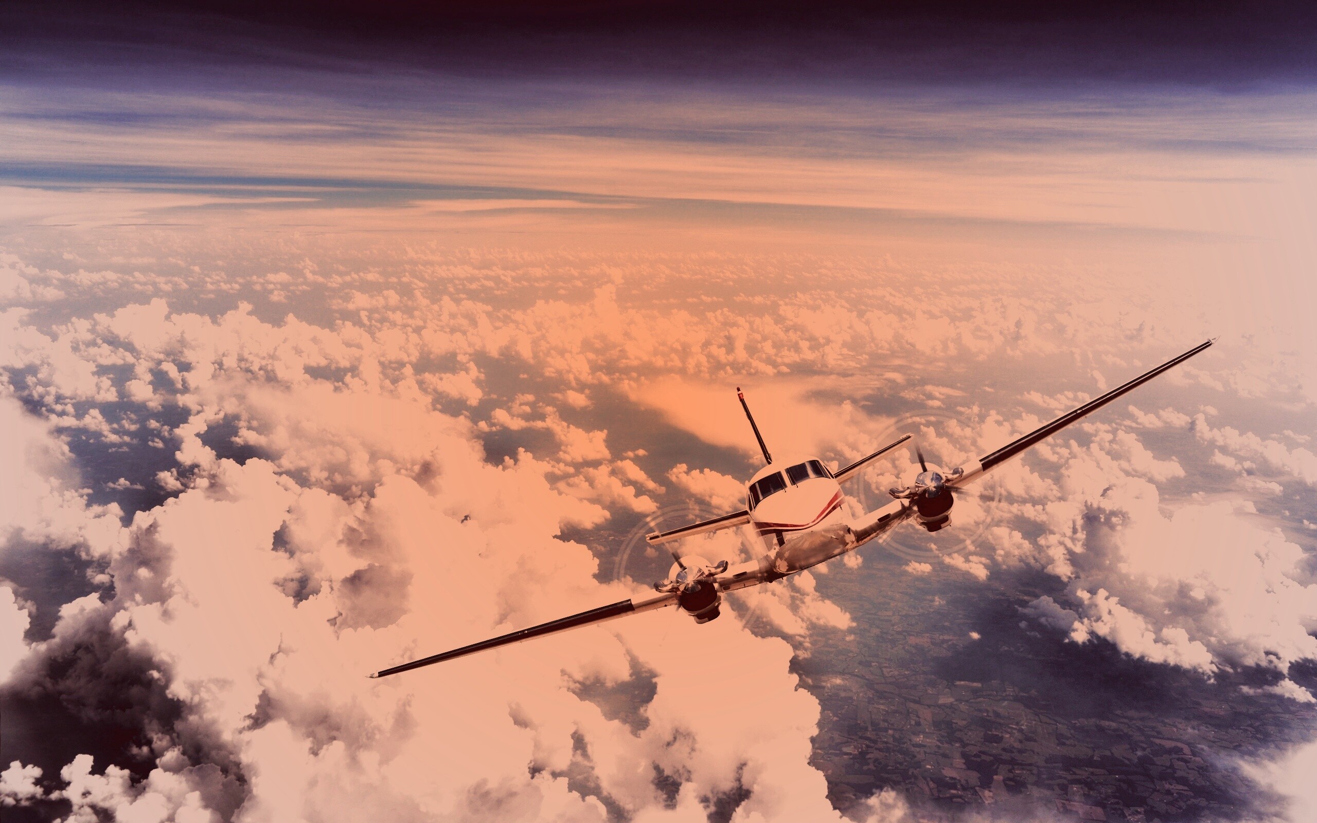 Самолет над облаками обои