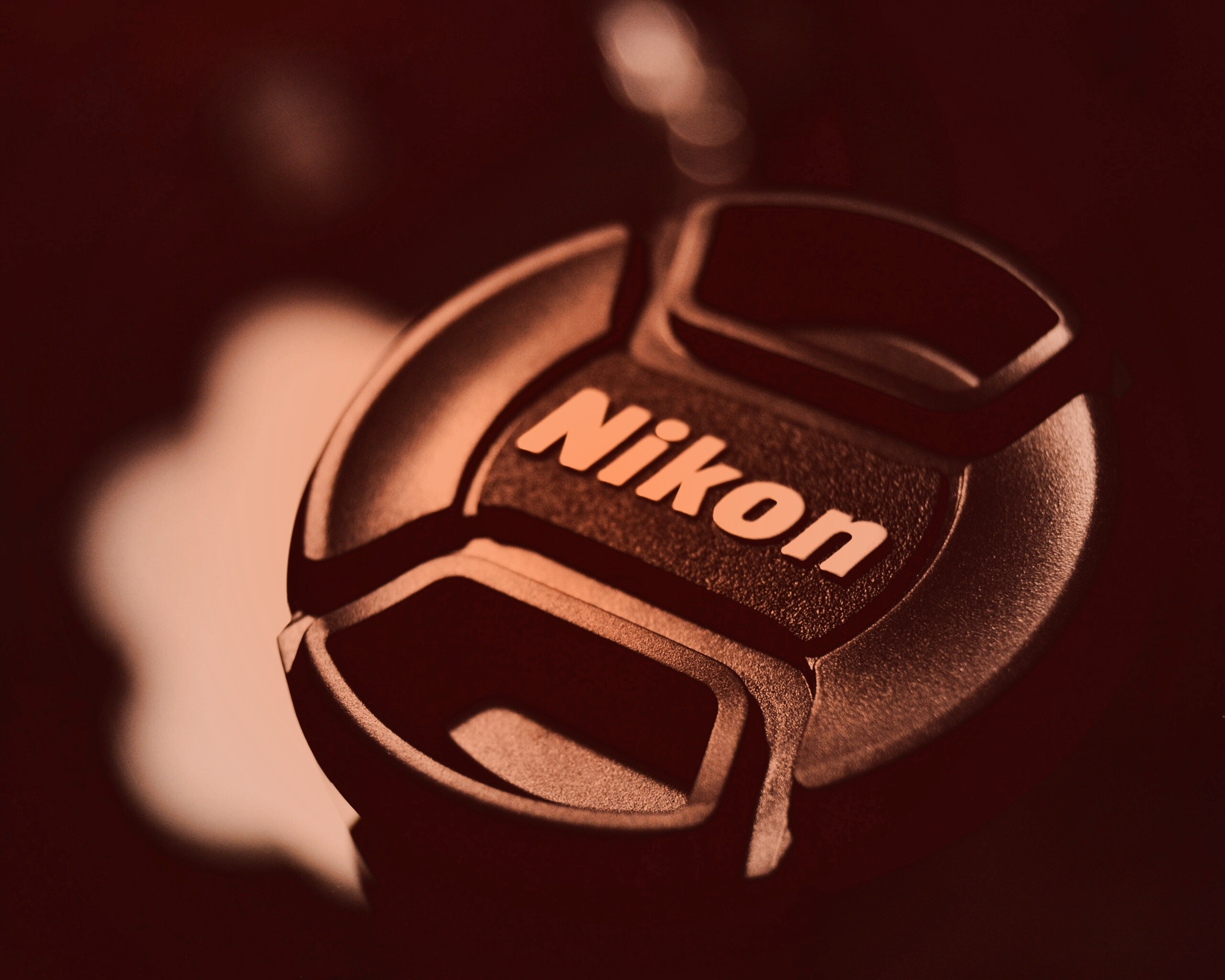 Крышечка от объектива Nikon обои