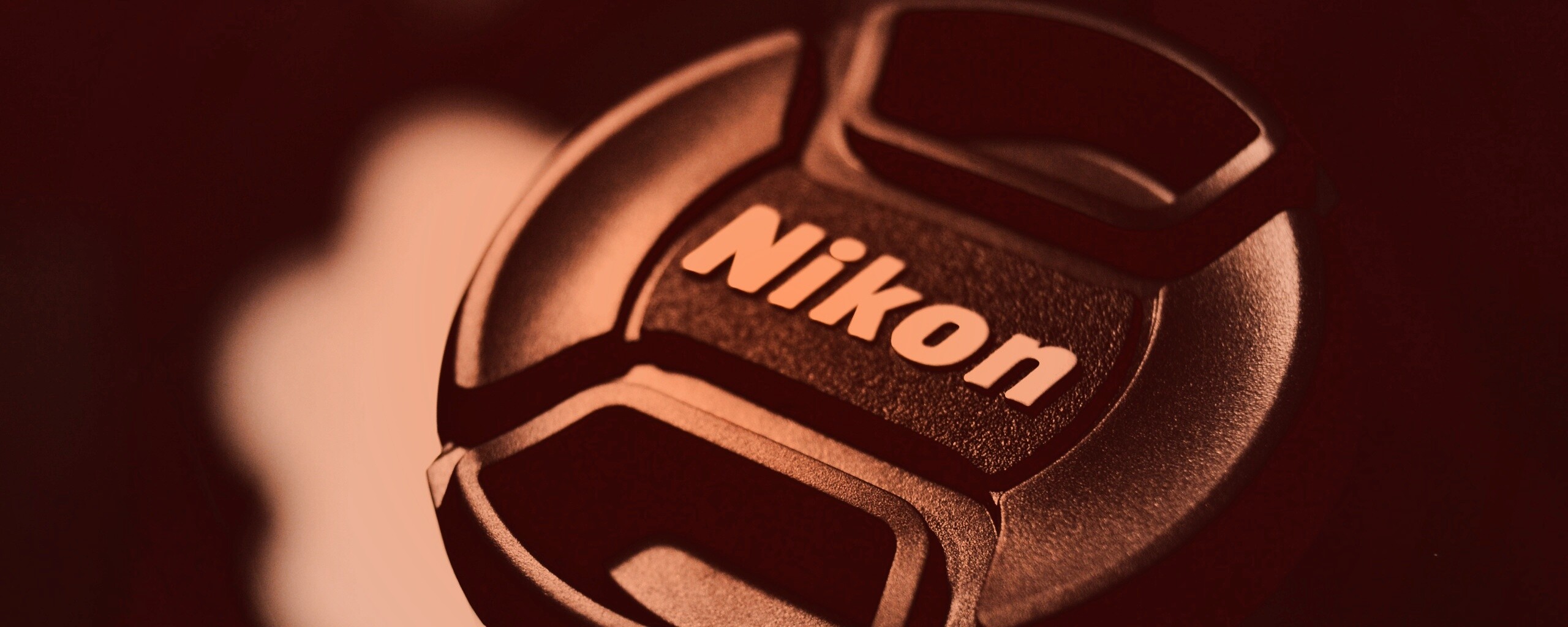 Крышечка от объектива Nikon обои