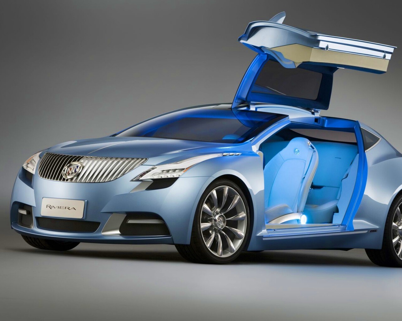 Buick Riviera с распахнутой дверцей обои