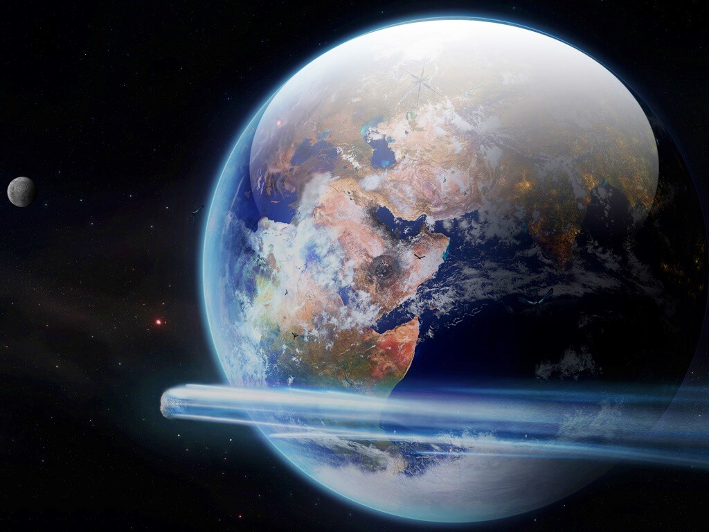 Метеорит пролетает мимо Земли обои