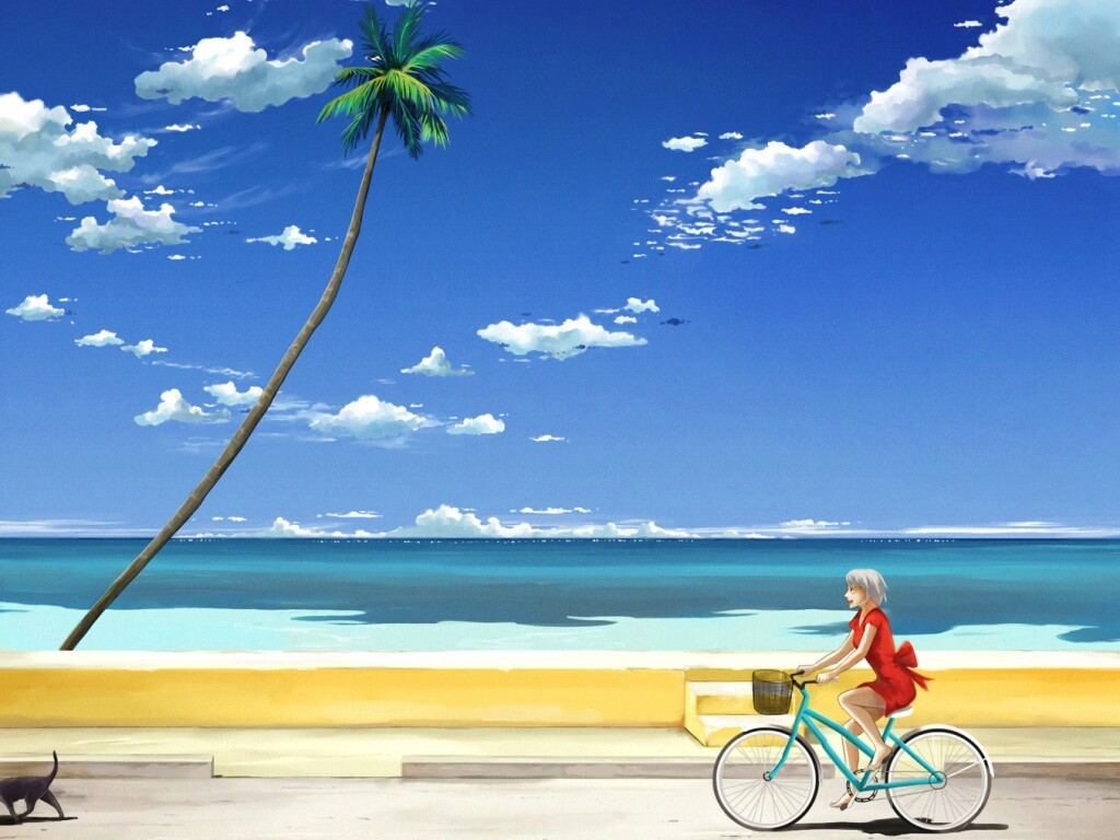 Девушка едет на велосипеде вдоль берега обои