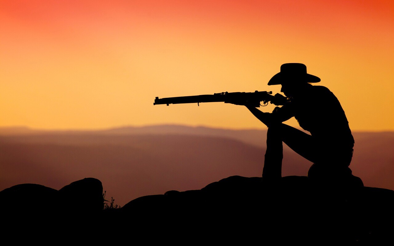 Стрелок на закате обои