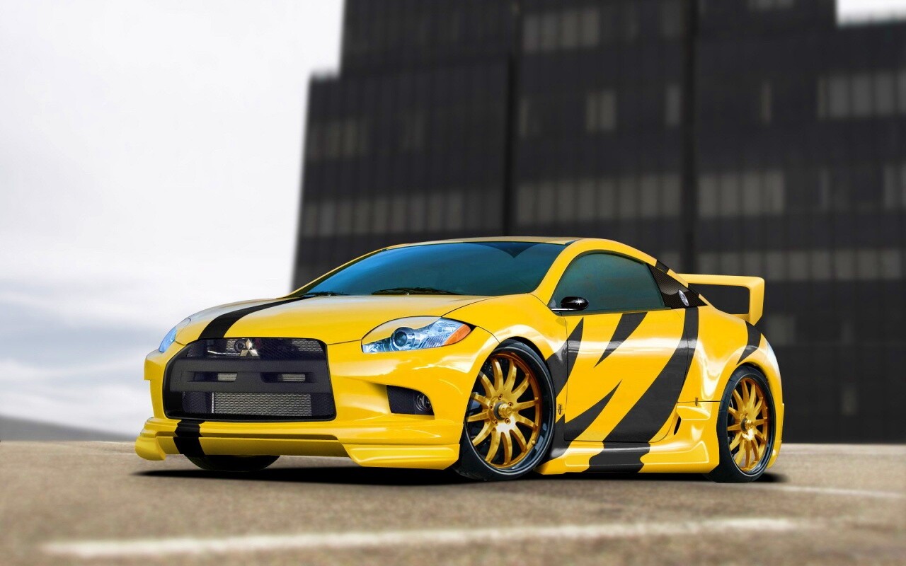 Mitsubishi жёлтого цвета с черными полосами обои