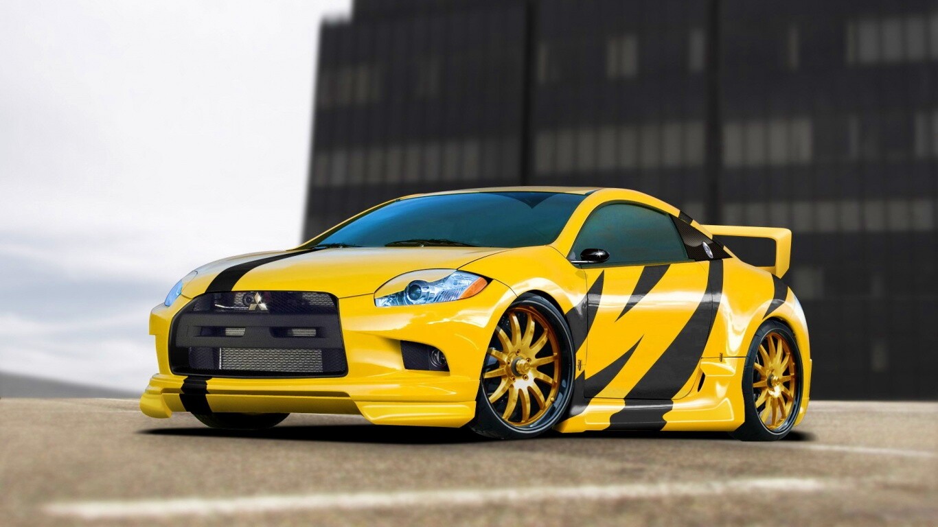 Mitsubishi жёлтого цвета с черными полосами обои