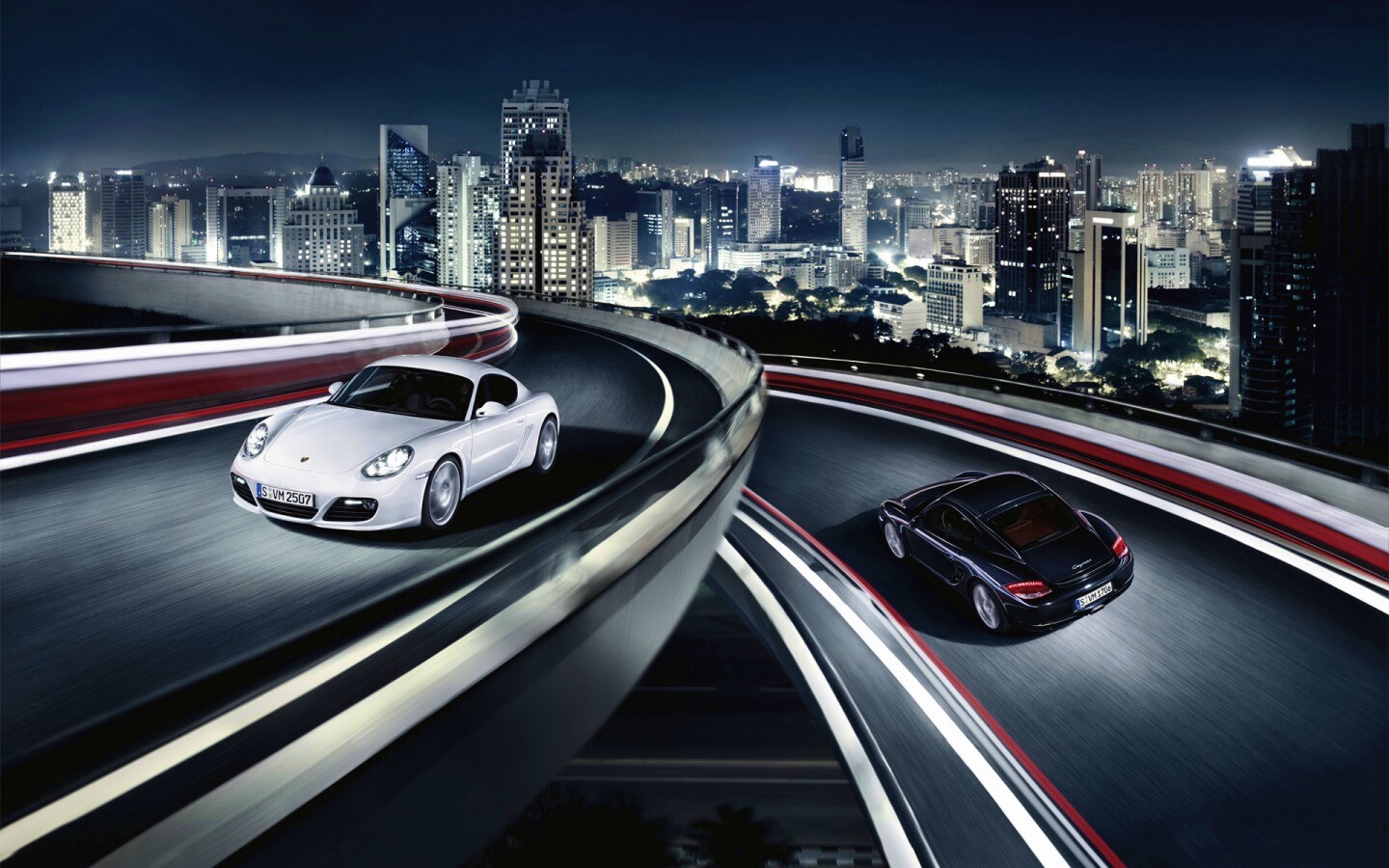 Черный и белый Porsche на автомагистрале. обои