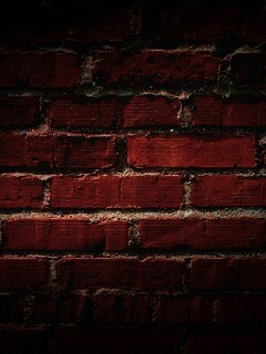 Затемненная кирпичная стена обои
