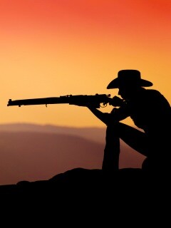 Стрелок на закате обои