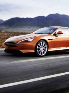 Астон Мартин на шоссе обои