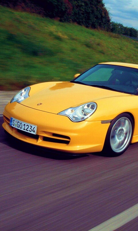 Желтый порш на повороте обои