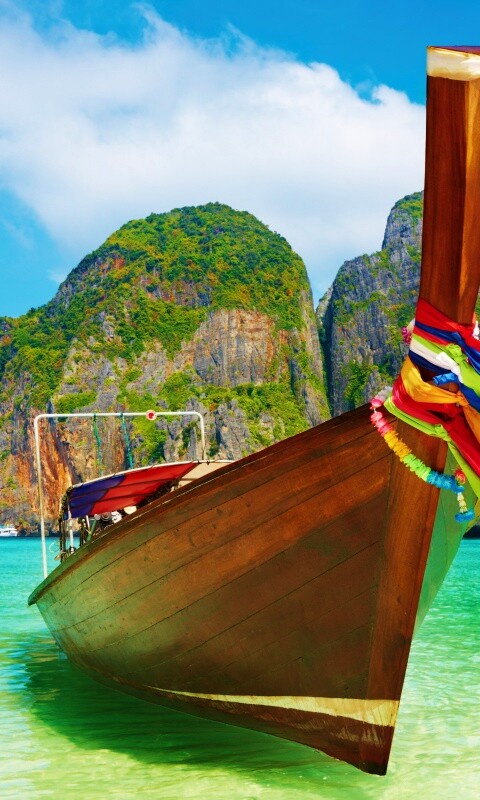 Лодка в райских водах обои