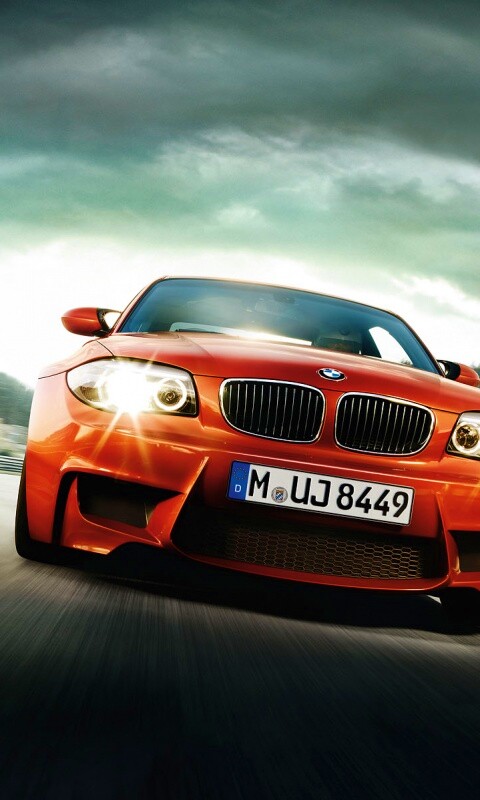 Оранжевый BMW M1 Coupe на треке обои