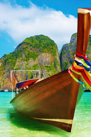 Лодка в райских водах обои