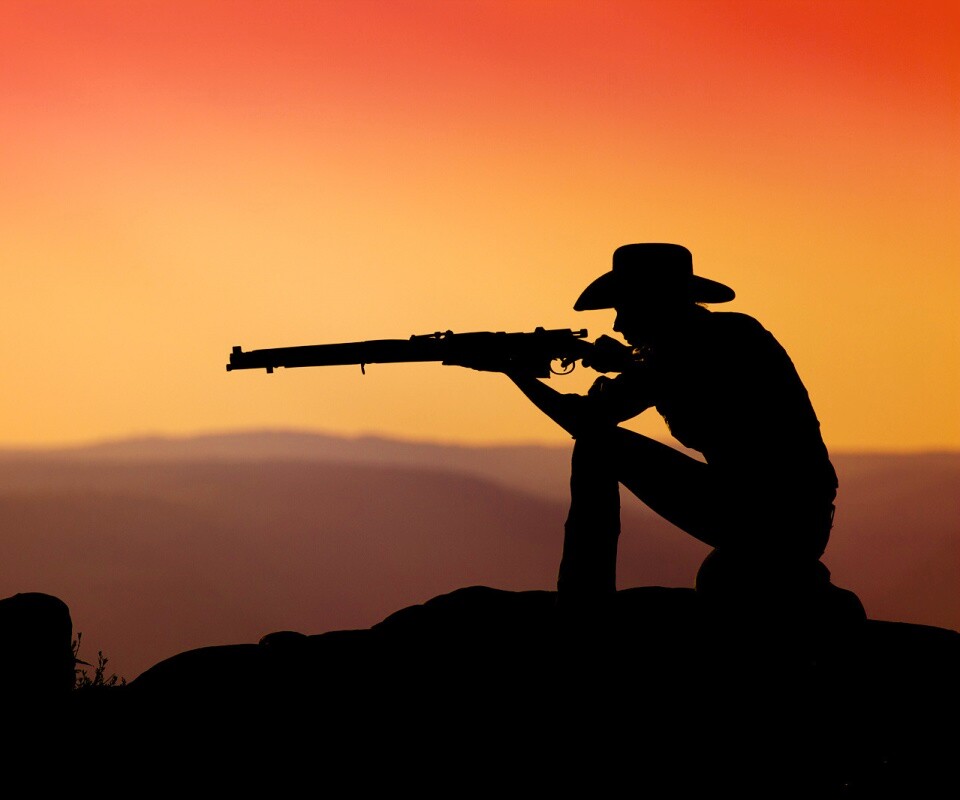 Стрелок на закате обои