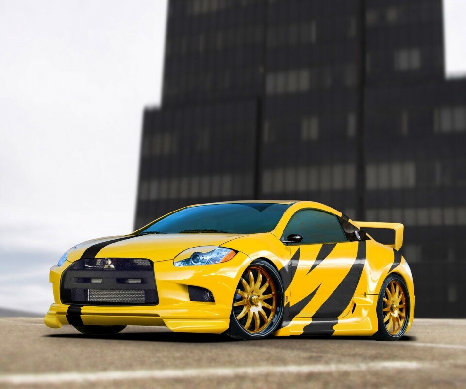 Mitsubishi жёлтого цвета с черными полосами обои