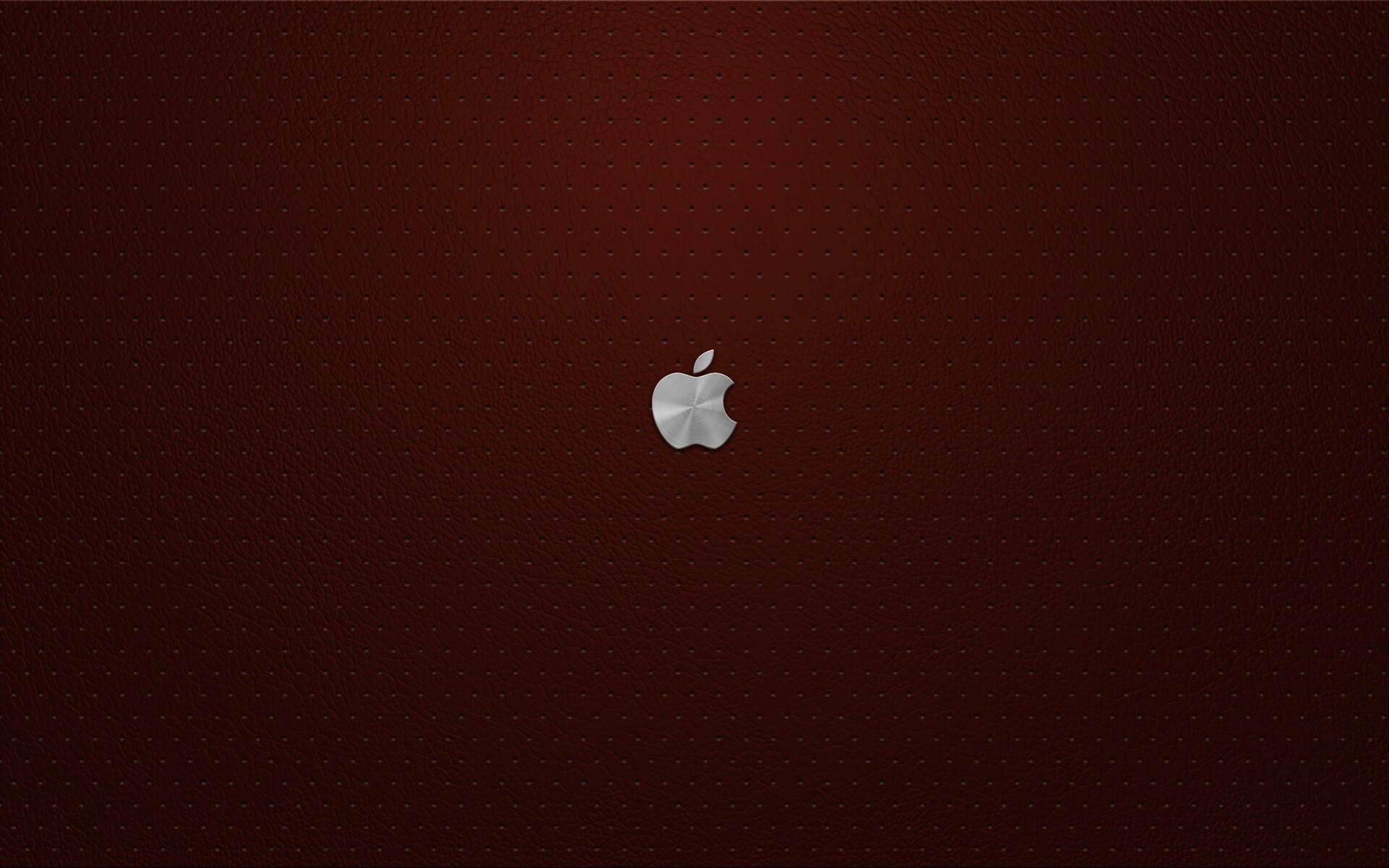 Маленький логотип Apple на перфорированной коже обои