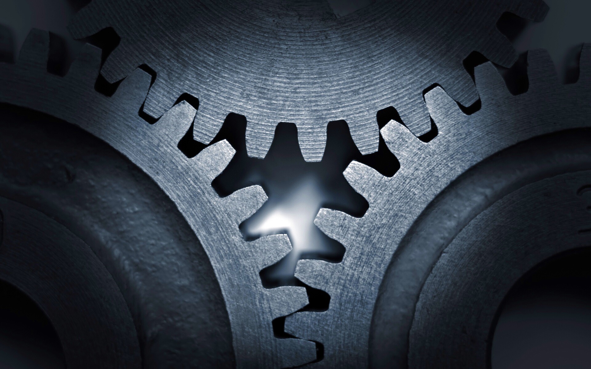 Три сцепленных шестерни обои