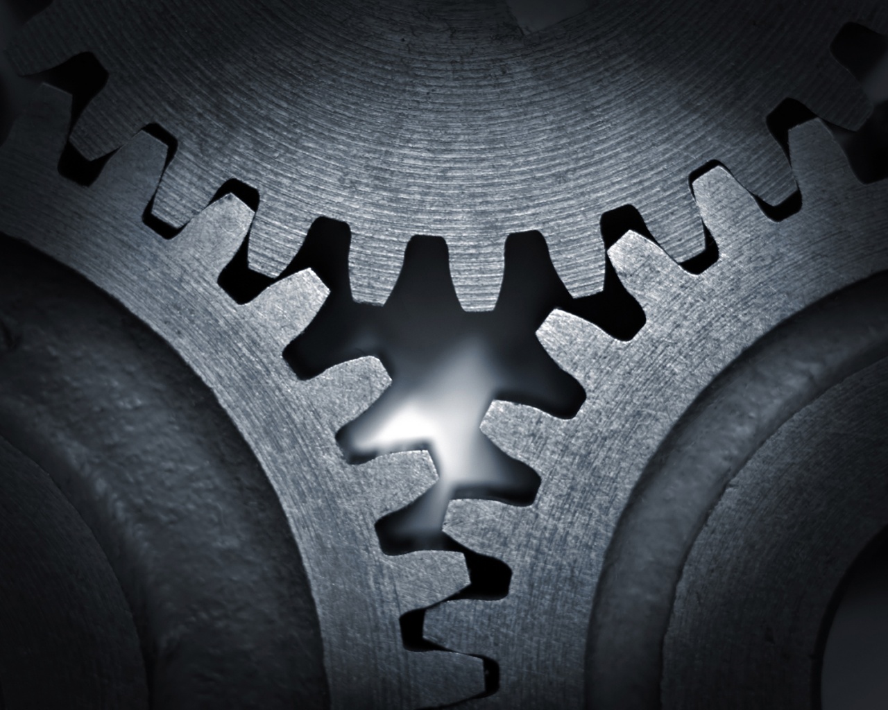 Три сцепленных шестерни обои