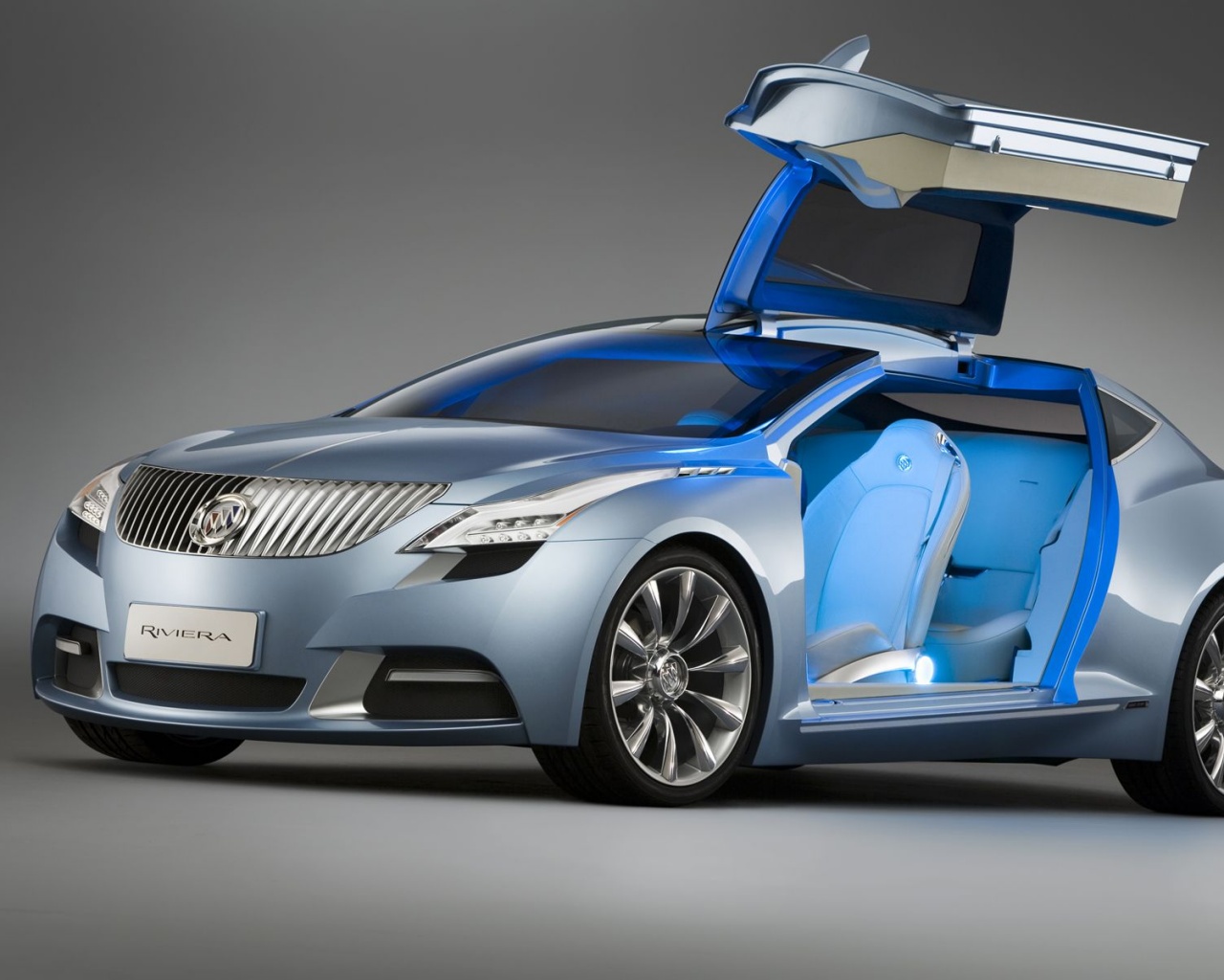 Buick Riviera с распахнутой дверцей обои