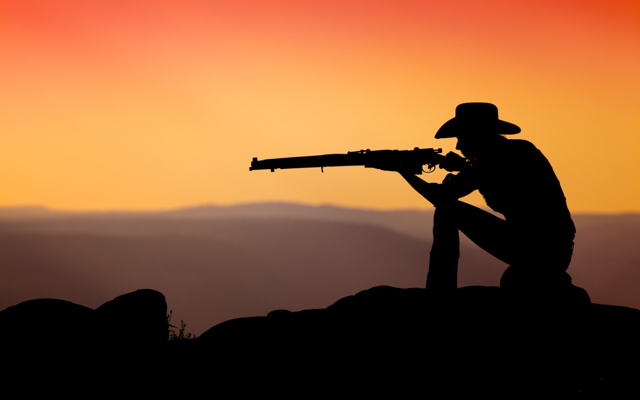 Стрелок на закате обои