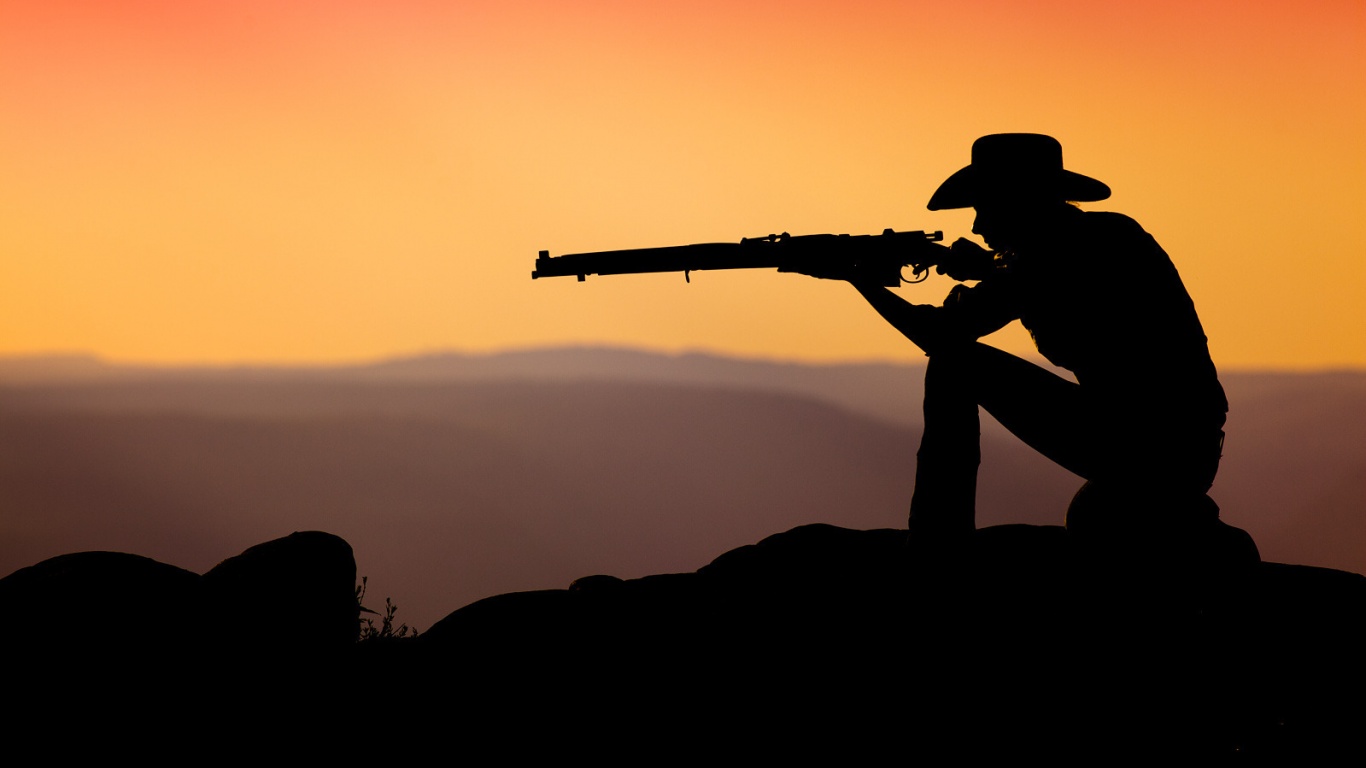 Стрелок на закате обои