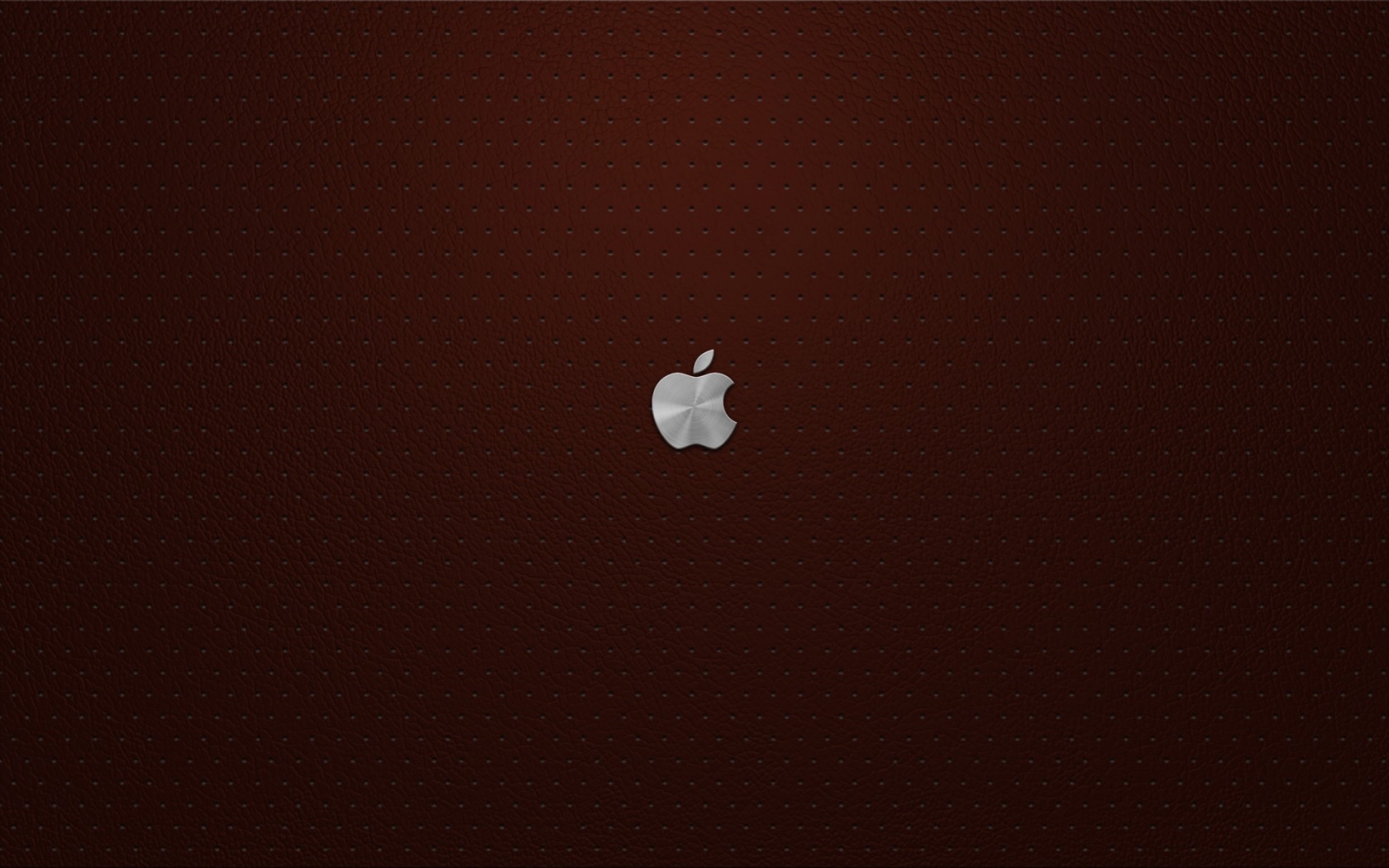 Маленький логотип Apple на перфорированной коже обои
