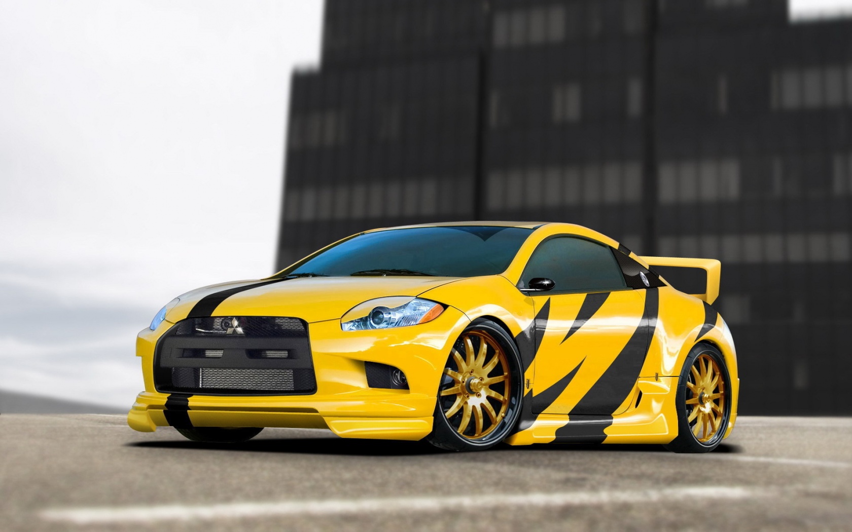 Mitsubishi жёлтого цвета с черными полосами обои