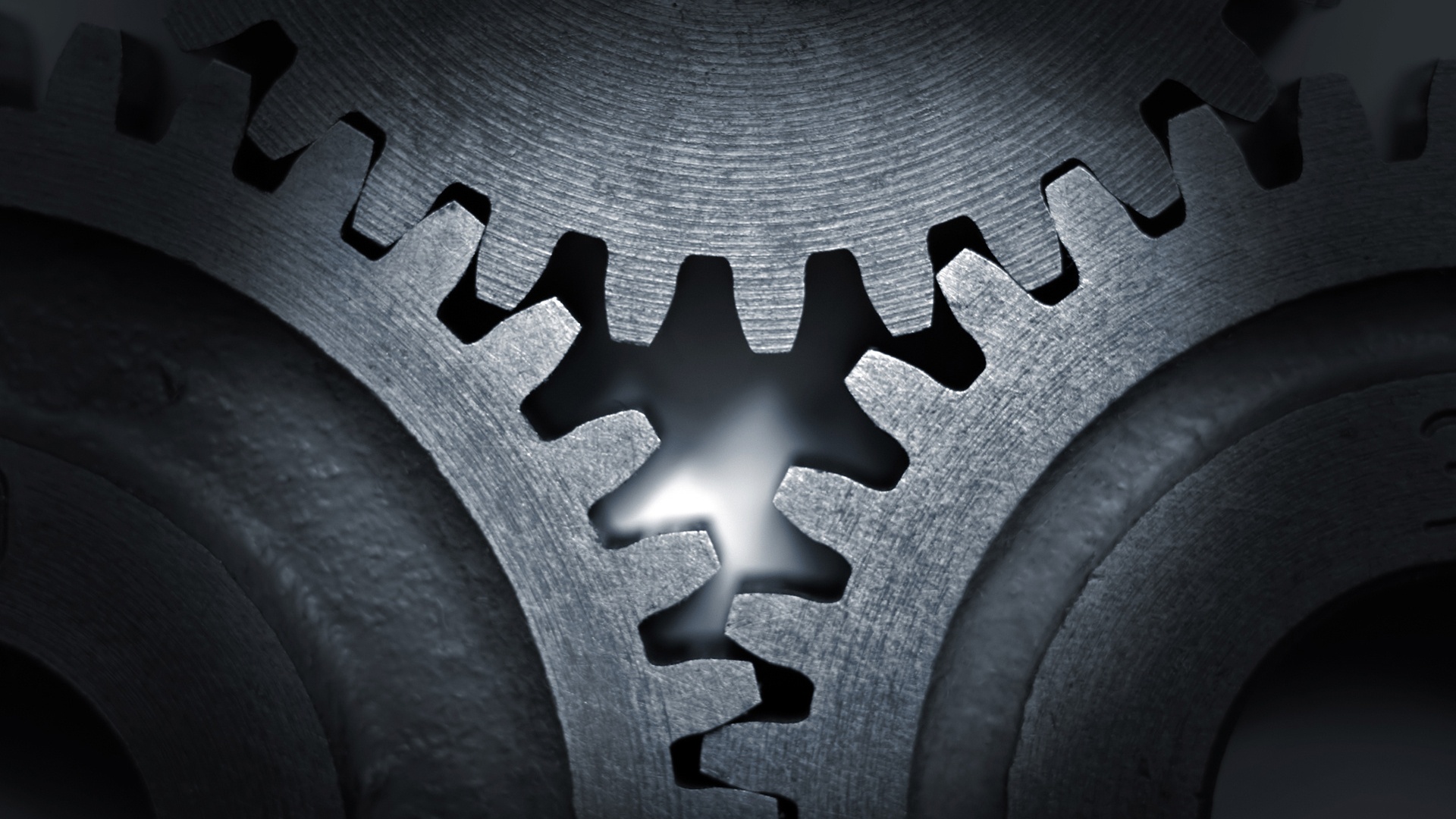 Три сцепленных шестерни обои