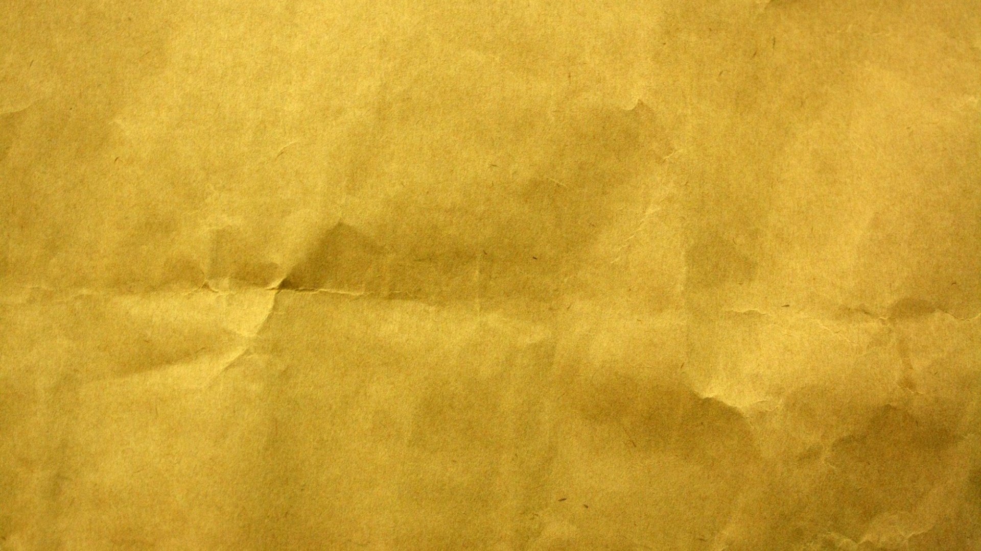 Текстура мятой желтой бумаги обои