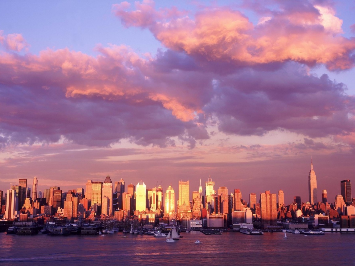 Панорама города на закате обои