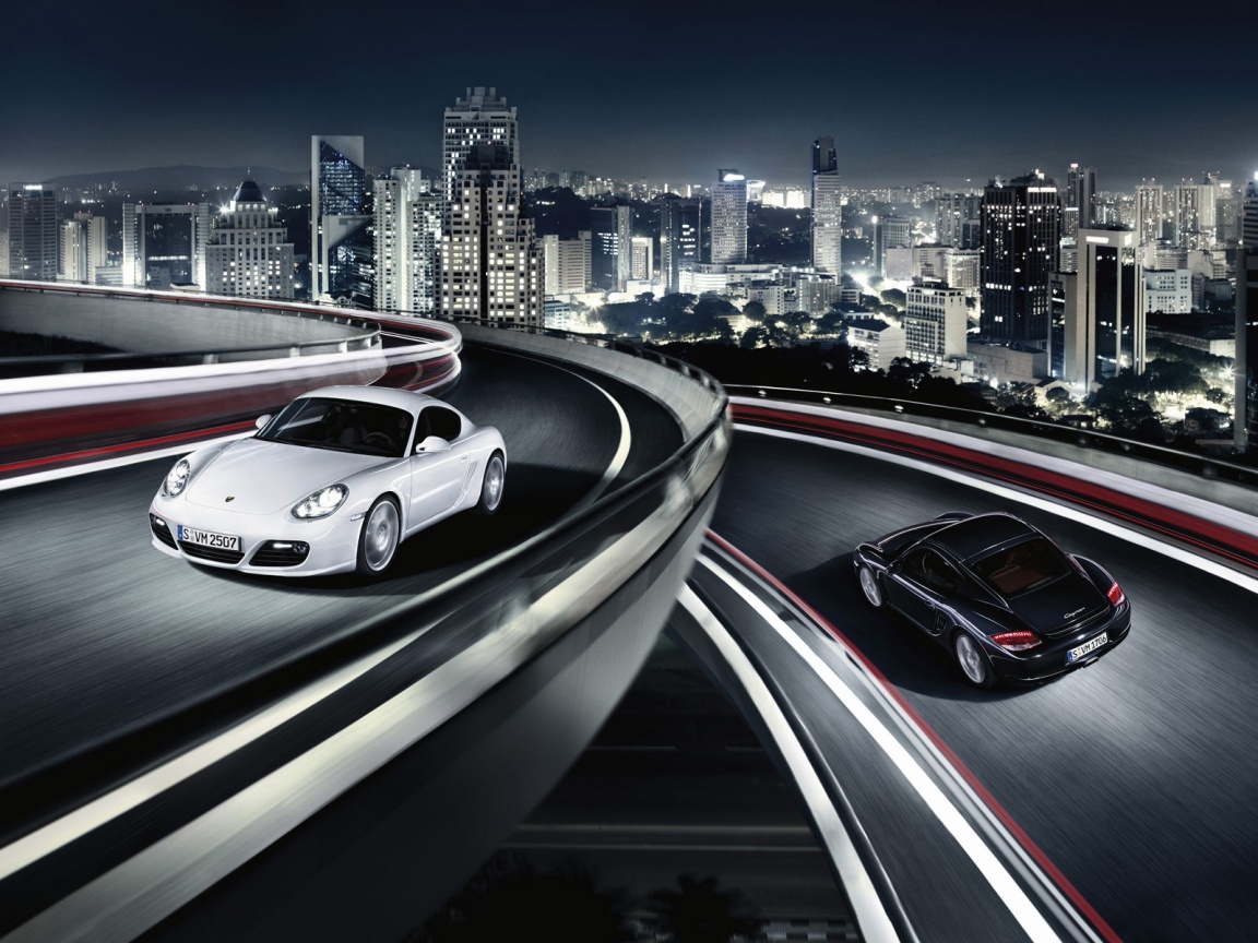 Черный и белый Porsche на автомагистрале. обои