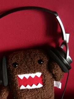 Демокун в наушниках обои