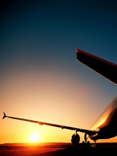 Самолет на закате обои