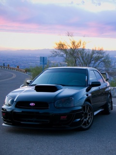 Субару на смотровой алощадке в горах обои